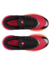 Championes de básquetbol Under Armour Curry Splash 26, con diseño bicolor en negro y rojo vibrante. Presentan capellada de tejido transpirable con refuerzos de TPU, cuello acolchado para mayor soporte y suela de goma resistente con tecnología de amortiguación reactiva UA HOVR.