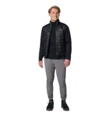 Pantalón técnico Columbia de corte ajustado, color gris, con paneles de diferente tonalidad en la parte inferior. Cuenta con cintura elástica ajustable con cordón y puños elásticos en los tobillos.