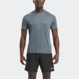 Remera de entrenamiento para hombre de Reebok, color gris jaspeado, con cuello redondo y manga corta. Presenta un ajuste estilizado y el logo de Reebok en el pecho.