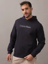 Buzo con capucha y cordón ajustable de color azul marino, de manga larga, con puños y dobladillo de canalé, y el logotipo de la marca estampado en el pecho con efecto degradado.
