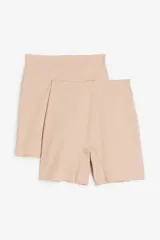 Pack de dos culottes tipo faja de tiro alto en punto elástico supersuave, color beige, con diseño sin costuras visibles.