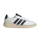 Championes Adidas modelo Barreda, de diseño urbano con capellada en cuero sintético blanco, icónicas tres tiras laterales en negro y suela de goma traslúcida tipo cupsole.