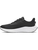 Championes de running Under Armour modelo Ascend, color negro con entresuela blanca. Confeccionados con malla transpirable y refuerzos en el mediopié, cuentan con amortiguación Charged+ Cushioning para mayor absorción de impactos y suela de goma resistente.