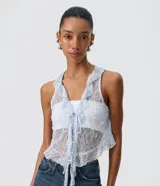 Blusa celeste de poliamida con encaje transparente, escote en V con volados y cordón ajustable delantero.
