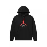 Canguro Nike Jordan Baseline Look Back de color negro, con capucha con cordón ajustable, bolsillo frontal tipo canguro y el logotipo Jumpman de Jordan en rojo con la palabra 'Flight' debajo en el centro del pecho.