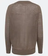 Blusa de punto color amarillo pálido, confeccionada en lino, con mangas largas y escote en pico.