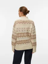 Cardigan de punto con estampado animal print, cuello en V y cierre frontal de botones. Presenta un diseño de textura suave y corte holgado.