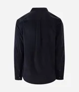 Camisa de hombre de corte regular confeccionada en terciopelo de algodón, con cuello clásico, cierre frontal de botones y dos bolsillos con solapa en el pecho.