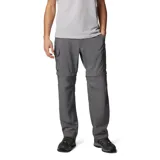 Pantalón de senderismo convertible en short, color gris, con múltiples bolsillos cargo y de seguridad. Fabricado con tecnología Omni-Shade para protección solar y Omni-Wick para gestión de la humedad, cuenta con cintura parcialmente elástica y cinturón integrado.