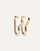 Aros ovalados de plata 925 bañada en oro de 18k.