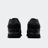 Championes urbanos New Balance modelo 574, color azul con detalles en gris y blanco, confeccionados en gamuza y malla, con logo "N" característico en los laterales y entresuela ENCAP.