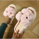 Pantuflas de peluche gris con diseño de chanchito, con suela de goma blanca y modelo abierto sin talón.