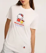Remera blanca de algodón con cuello redondo y mangas cortas. Estampado en la espalda con dibujos de Hello Kitty y productos de supermercado.
