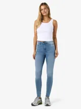 Jean skinny de tiro alto en denim elástico y diseño clásico de cinco bolsillos.