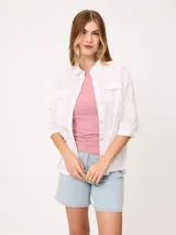 Musculosa de algodón peinado azul, confeccionada en punto sencillo con cuello redondo y diseño ajustado.