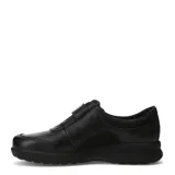 Zapatos casuales de mujer Lombardino modelo Mery, color negro, confeccionados en cuero y nobuk, con cierre de velcro en el empeine y suela de goma.
