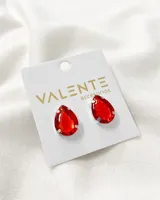 Aros de gota color rojo con engarce plateado.