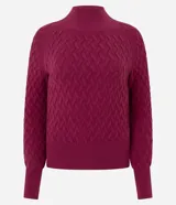 Suéter Marfinno de punto color fucsia, con cuello alto, manga larga ajustada y textura en zigzag.