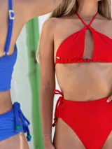 Top de bikini negro, modelo halter con argolla decorativa de resina. Se ata en la nuca y en la espalda.