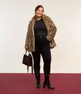 Pantalón super skinny negro de tiro alto, confeccionado en punto Roma, con bolsillos y diseño ajustado al cuerpo.