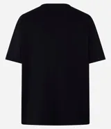 Remera boxy de manga corta y cuello redondo, confeccionada en algodón liso negro de corte holgado.