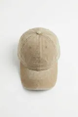Gorra tipo cap de algodón con efecto gastado y visera curva.