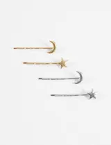 Set de cuatro horquillas para el pelo, dos doradas y dos plateadas, con dijes de luna y estrella.