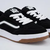 Championes Vans modelo Hylane de color negro con detalles en blanco y suela de goma marrón, con diseño robusto y cordones gruesos.