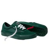 Championes Vans Skate Curren Caples, color verde oscuro, con cordones blancos, suela de goma y detalles de la marca en el lateral y el talón.