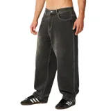 Pantalón de jean Rip Curl modelo Archive Dirty Denim, color negro con efecto gastado, corte holgado y costuras en contraste.