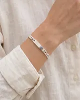 Pulsera de plata 925 con diseño de cadena de eslabones y placa central lisa.