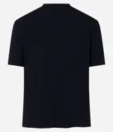 Blusa blanca de mangas cortas confeccionada en viscosa con cuello redondo con brillos en formas florales.