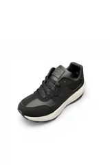 Zapatilla deportiva Pdk Bliss en tonos beige, marrón y blanco, con diseño de paneles combinados y suela chunky de goma.
