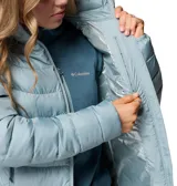 Chaqueta acolchada de cuello alto con cierre frontal, bolsillos laterales con cremallera y tecnología termorreflectante Omni-Heat. Diseño ligero con aislamiento sintético y acabado repelente al agua.