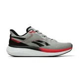 Championes deportivos Reebok modelo Viva Speed, color gris con detalles en negro y rojo. Presentan un diseño de malla transpirable, logo de la marca en el lateral y una suela con amortiguación blanca con una franja roja.