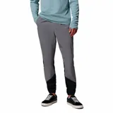 Pantalón Columbia Tech Nylon Omni-Shield gris con inserciones negras en la parte inferior de las piernas, puños elásticos y cintura ajustable.