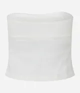 Top strapless color crema, de sarga de algodón y elastano, con cierre lateral de cremallera.