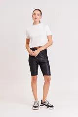 Calza biker negra con lurex plateado.