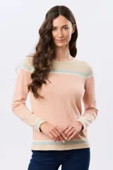 Buzo tejido de algodón con diseño a rayas en tonos beige, rosado, celeste y blanco, de cuello redondo y manga larga.
