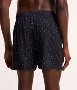 Calzoncillo tipo boxer de tela confeccionada en viscosa, con cintura elástica y estampa de mini losangos coloridos.
