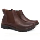 Botas Chelsea de cuero marrón oscuro, con elásticos laterales y suela de goma negra.