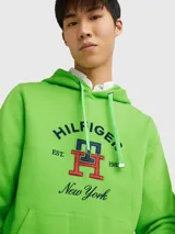 Buzo verde con capucha y cordón ajustable, confeccionado en felpa de algodón. Presenta un bolsillo tipo canguro y un monograma TH bordado en el pecho.