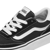 Championes Vans modelo Brooklyn Ls Platform, de diseño urbano con plataforma, confeccionados en lona y gamuza negra con la icónica banda lateral blanca y suela de goma blanca.