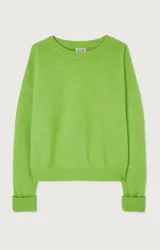 Sweater gris claro de lana, con cuello redondo y corte holgado.