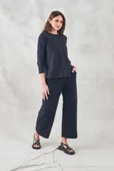 Sweater blanco de algodón y poliéster, de corte holgado y manga 3/4.