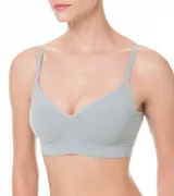 Soutien top blanco de microfibra, sin aro ni relleno, con breteles finos y espalda deportiva.