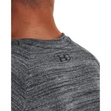 Remera deportiva Under Armour de manga corta, confeccionada en tejido técnico ultrasuave de secado rápido con textura jaspeada. Presenta cuello redondo y logo de la marca estampado en el pecho.