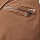 Short de baño marrón con cintura amarilla, cordón de ajuste y detalles estampados en blanco a los costados.