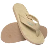 Ojotas Havaianas Surfer Coast, color negro, con tiras de tela texturizada y suela con diseño ondulado.