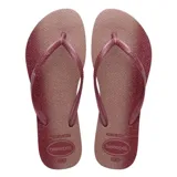 Sandalias Havaianas Slim Gloss negras con estampado de estrellas blancas.